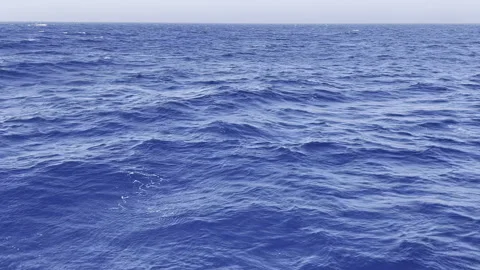 Blue ocean waves rolling from boat Stock Footage 287186485