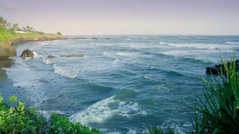 Blue ocean waves in soft evening light in tropical paradise. Stock Footage 156036745