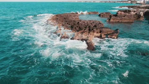 Blue Ocean With Waves Splash On Rocky Shoreline At Summer In Capitolo Stock Footage 157803634