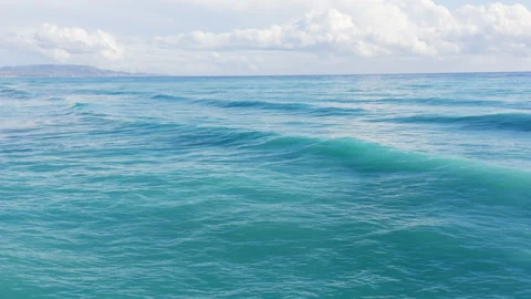 Blue ocean waves on sunlight Видео 239529188