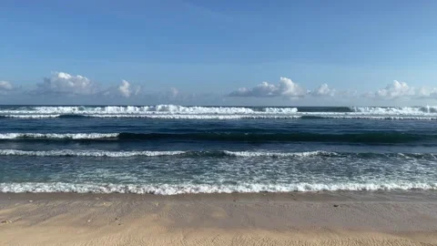 Blue ocean waves on a white beach in Bali Stock Footage 202636498