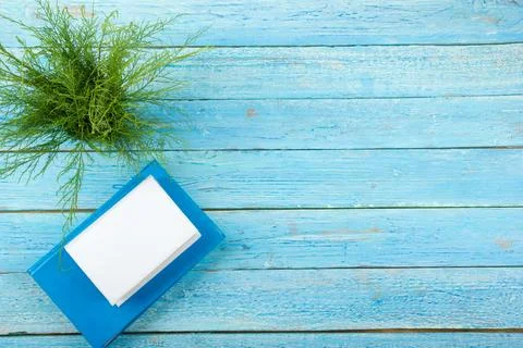Blue office desk table with computer, pen and a cup of coffee, lot of things. Stock Photos