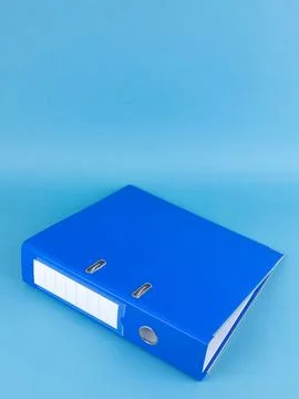 Blue office folder on blue background. Office Folder Template Stock Photos