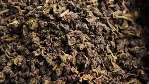 Blue oolong dried tea leaf. Oolong tea health benefits, weight loss, boosts Stock Footage 306603144