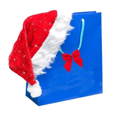 Blue packet with santa hat Stock Photos