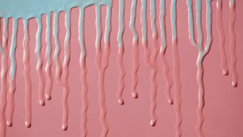 Blue paint background, color tint drops on pink wall close-up. Renovation Stock Footage 171470732