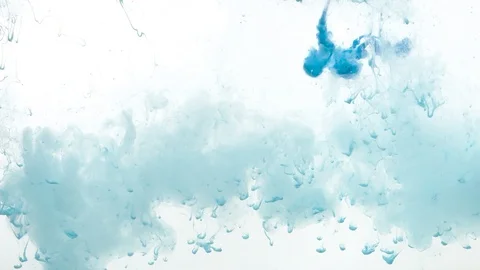 Blue paint dripping and dissolving in water Stock Footage 123691884
