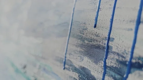 Blue paint flowing down the canvas Video stock 231912710