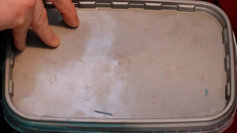 Blue paint is mixed using a paint brush Stock Footage 101165928