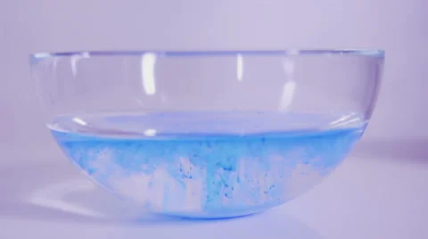 Blue paint solution in water Stock Footage 58761411