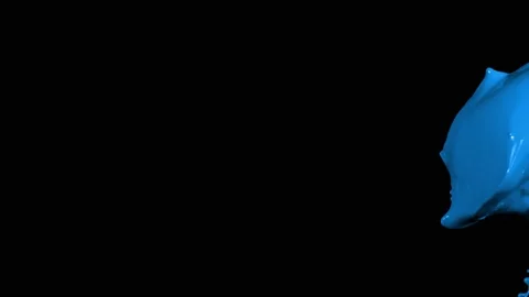 Blue paint splash thrown in slow motion, liquid isolated on black (4K) Video stock 137111165