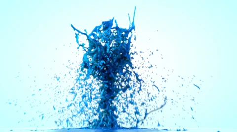 Blue paint splashing, isolated on bright backgorund Stock Footage 39077363