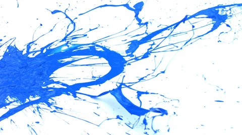 Blue paint splattering on white background