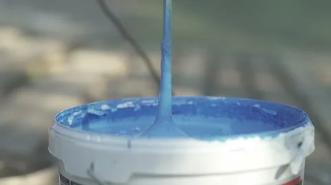 Blue paint in a white bucket Stock Footage 57686057