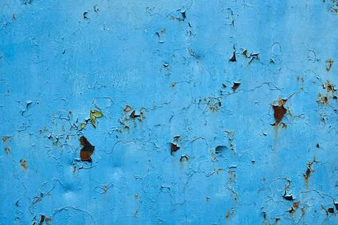 Blue painted metal surface with rust showing through, surface texture Stock Photos
