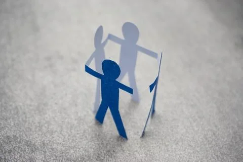 Blue paper man work group people holding hands each other. Stock Photos