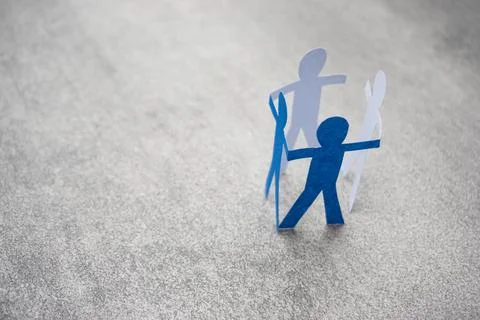 Blue paper man work group people holding hands each other. Stock Photos