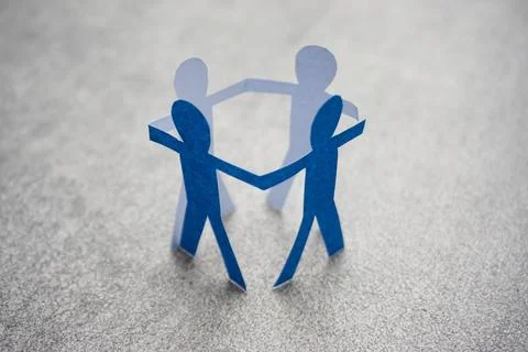 Blue paper man work group people holding hands each other. Stock Photos