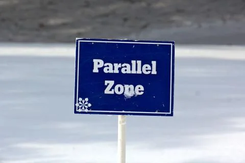 Blue Parallel Zone Sign on the Ski Slopes Stock Photos