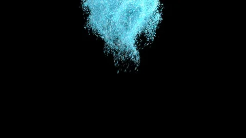 Blue particle powder transform to punch shape Video stock 124995472
