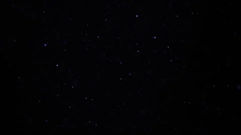 Blue particles and dust floating on a bl... | Stock Video | Pond5