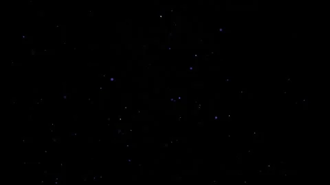 Blue particles and dust floating on a bl... | Stock Video | Pond5
