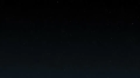 Blue Particles on Black Background. Glitter Particles with Stars. Bokeh Shiny Stock Footage 238034733