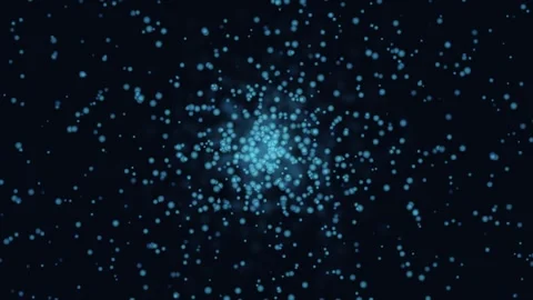 Blue particles exploding outwards with subtle light flares during a dark am.. Video stock 342430621