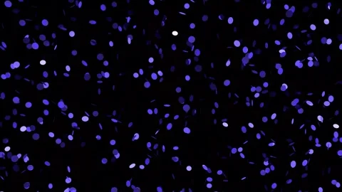 Blue particles with highlights on a black background, festive background. Stock Footage 253094560