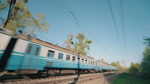 Blue Passenger Train Moving Fast Along Railway Track | Suburban Electric Train Stock Footage 334059568