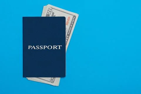 Blue passport lying on the background Stock Photos