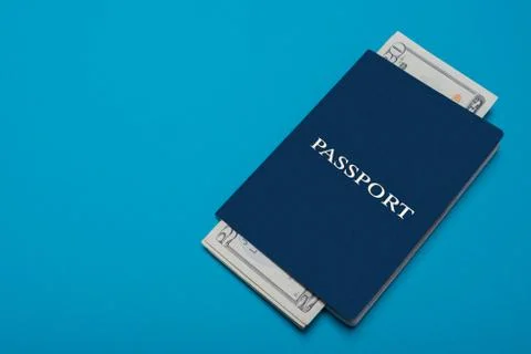 Blue passport lying on the background Stock Photos