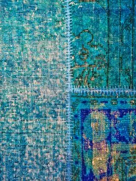 Blue patchwork rug Stock Photos