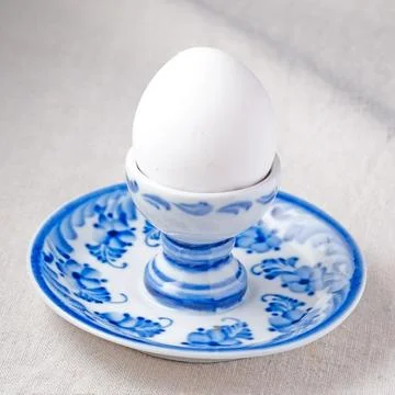 Blue pattern plate for boiled egg on breckfast Stock Photos