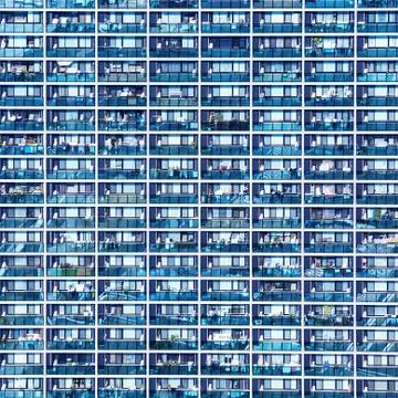 Blue pattern with small balconies and windows, Osaka, Japan Stock Photos