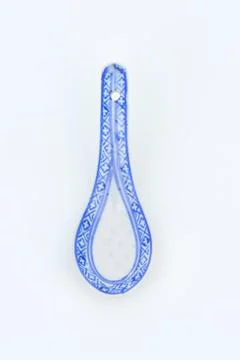 Blue patterned Asian soup spoon Stock Photos