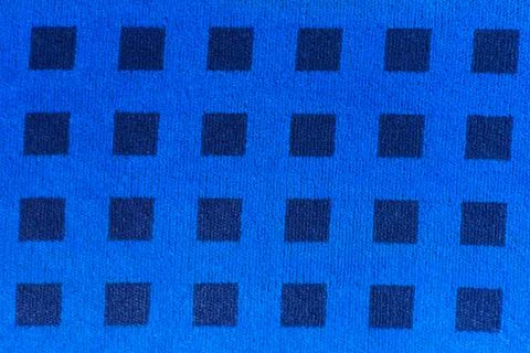 Blue patterned fabric Stock Photos