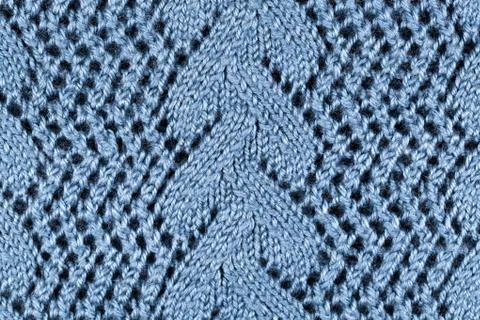 Blue patterned knitted fabric Stock Photos