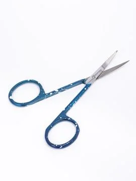 Blue patterned nail scissors curved Stock Photos