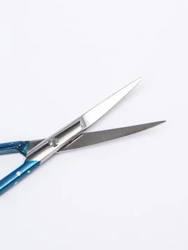 Blue patterned nail scissors straight Stock Photos