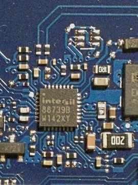 Blue pcb with intersil microchip Stock Photos