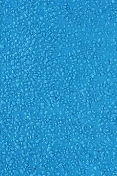 Blue pebble dash wall texture background Stock Photos