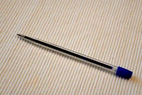Blue pen on light background Stock Photos