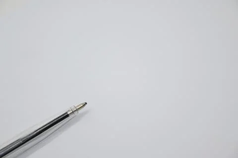 Blue pen without cap on white background, openness and vulnerability concept, Co Photos