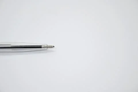Blue pen without cap on white background, openness and vulnerability concept, Co Stock Photos