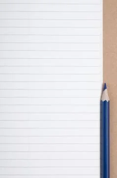 Blue pencil on note Stock Photos