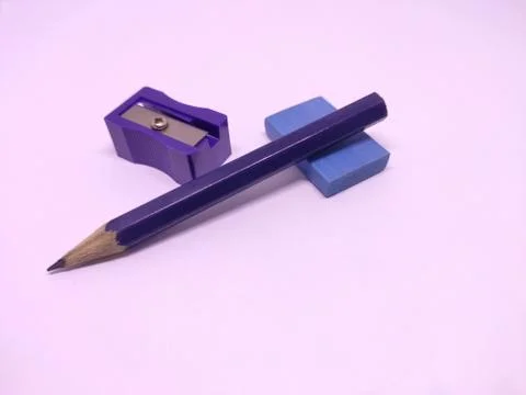 Blue pencil with sharpner and eraser isolated in white background Stock Photos