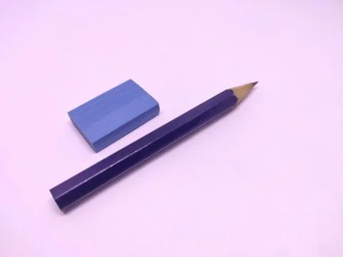 Blue pencil with sharpner and eraser isolated in white background Stock Photos