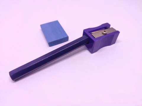 Blue pencil with sharpner and eraser isolated in white background Stock Photos