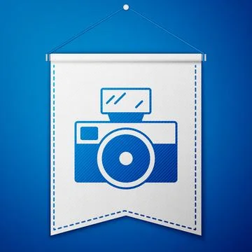 Blue Photo camera with lighting flash icon isolated on blue background. Foto Stock Illustration